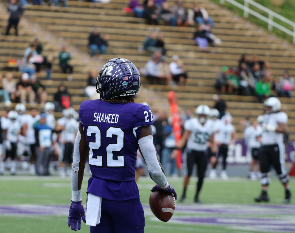 Weber State University's Rashid Shaheed (#22) looks to return the ball following the kick off. (Bella Torres / The Signpost)