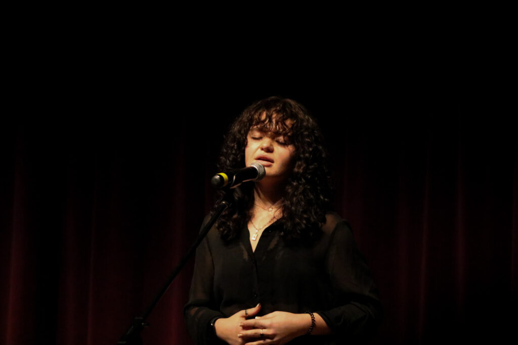 Weber State student, Grace Zito, as she performs "Shallow" by Lady Gaga and Bradley Cooper. (Bella Torres / The Signpost)