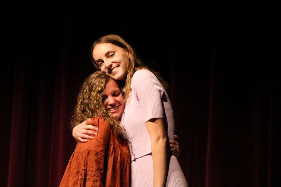 Newly elected President Ashley Potokar (left) hugs VP of Activities Colette Mortensen (right) tightly in celebration. (Bella Torres / The Signpost)
