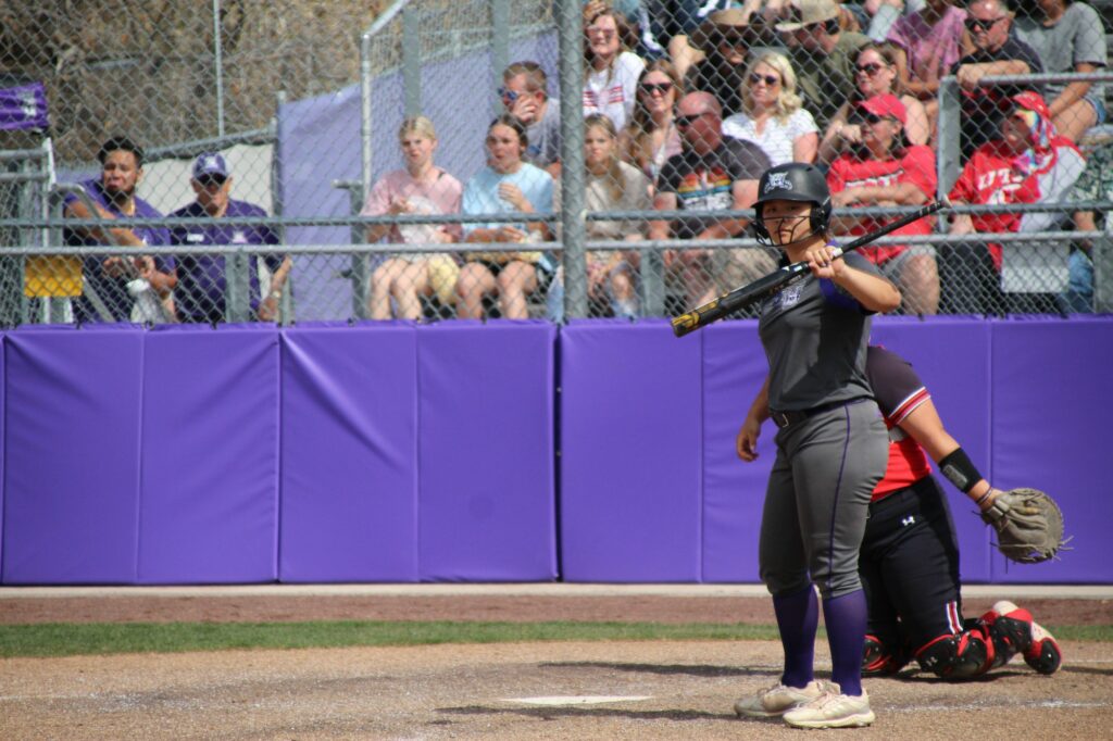 Weber State Softball player Mika Chong changes position after a pitch from UofU. (Summer Muster/The Signpost)