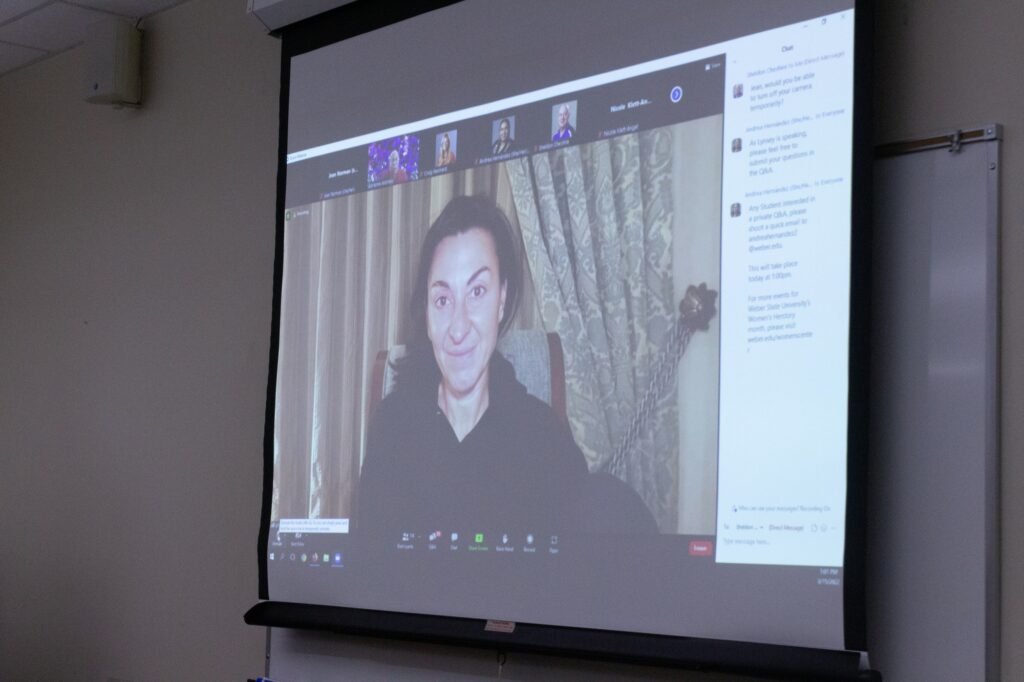 Lynsey Addario taking questions with students after her presentation. (Kennedy Robins/ The Signpost)