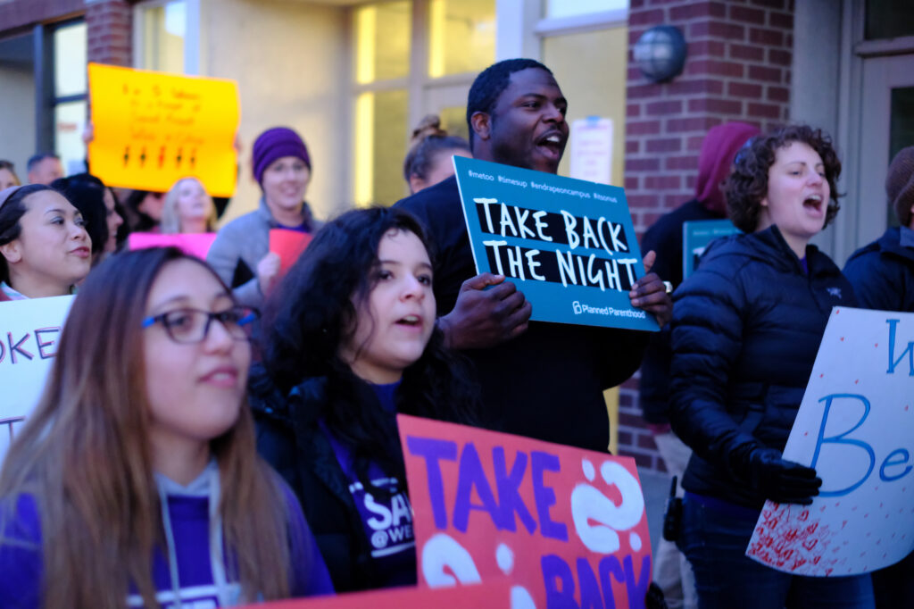 Participants in the Take Back the Night march on 25th Street in April 2018.