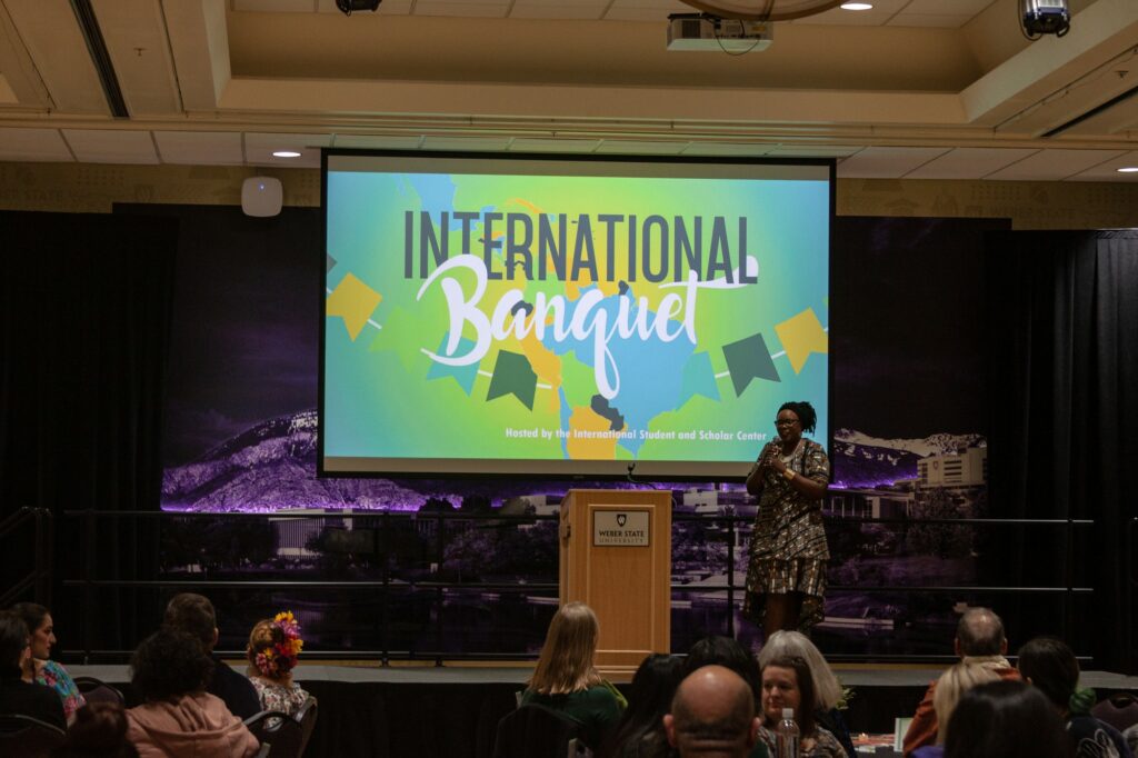 The annual Weber State University International Banquet was opened up by the International Student and Scholar Center's director, Dr. Mary Machira. (Bella Torres / The Signpost)