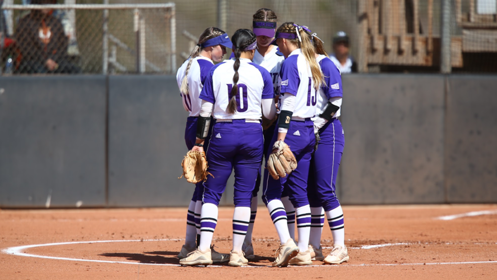 The team gather in a huddle before the game against ISU. (Weber State Athletics)