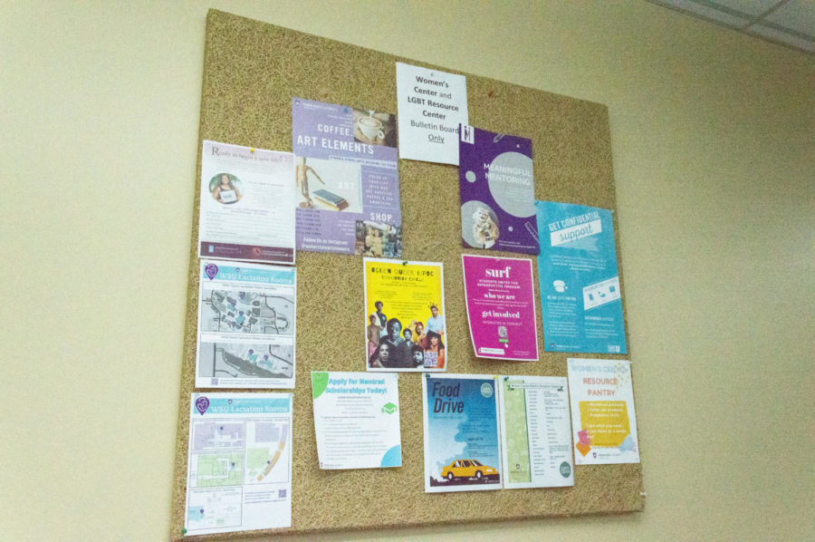 A board on the outside of the Womens Center with information posted about the center. (Kennedy Camarena/ The Signpost)