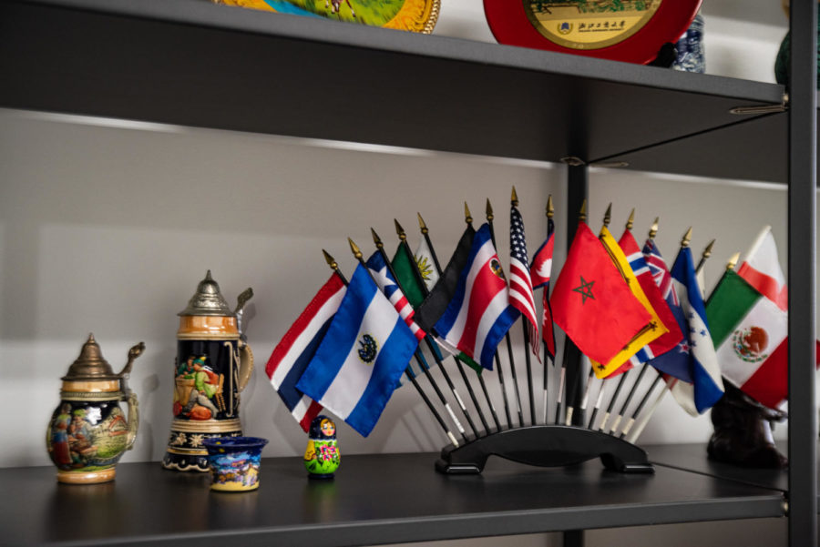 International+Student+and+Scholar+Center+display+with+flags+and+items+representing+other+countries.