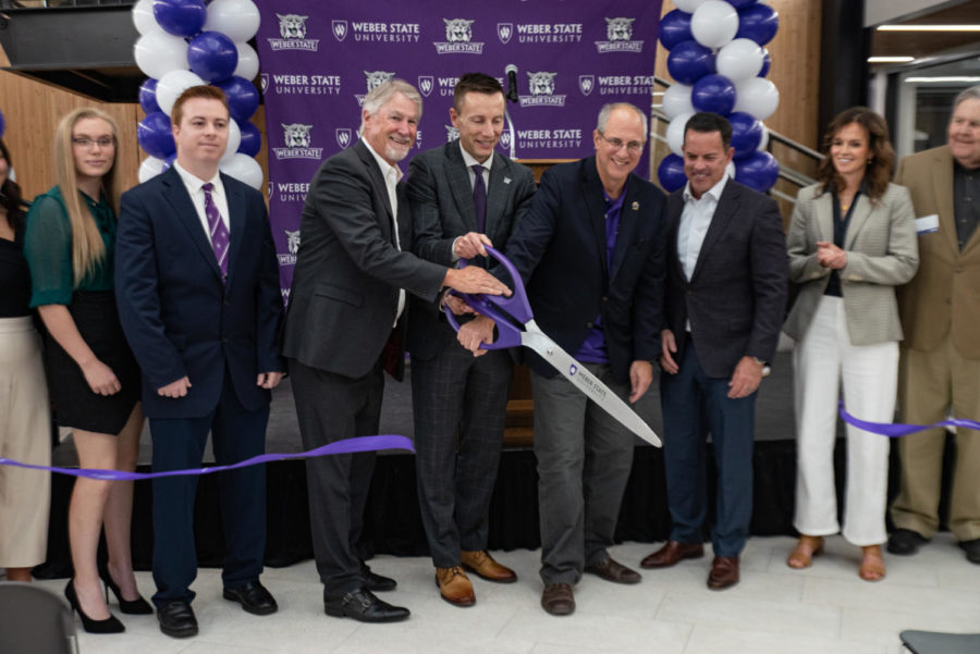Ribbon being cut as an opening of the new Noorda Engineering building at Weber State.