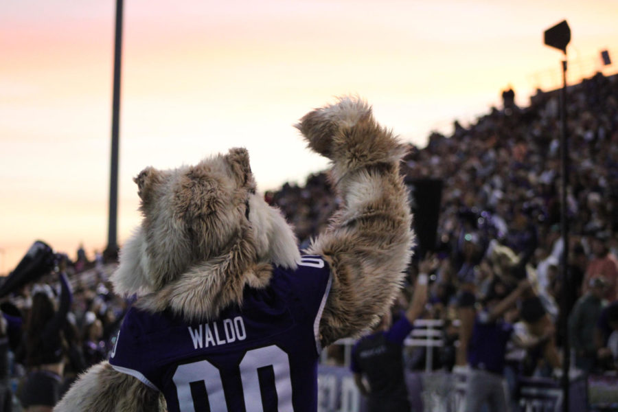 Waldo+the+Wildcat+helps+bring+team+spirit+to+the+crowd+and+gets+them+cheering+alongside+the+cheerleaders.