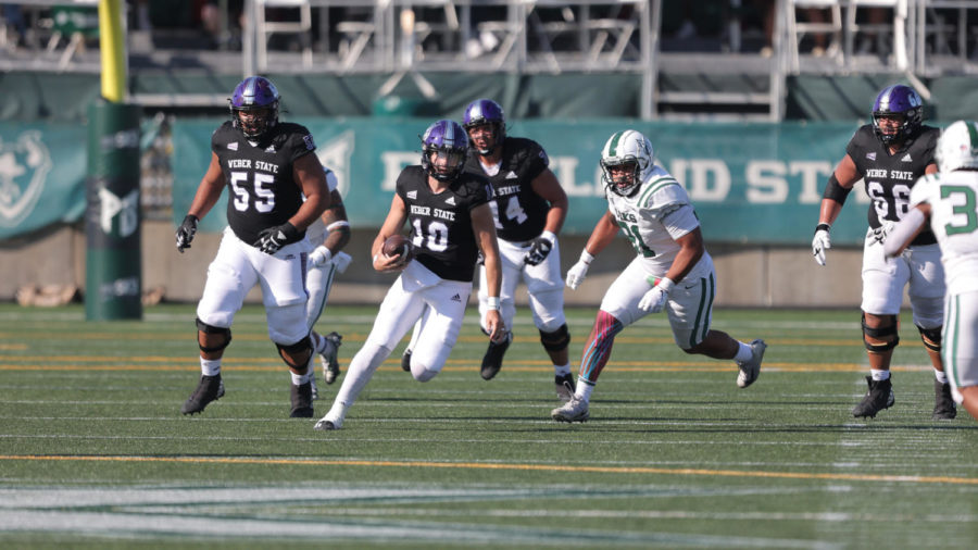 Bronson Barron (10) looks for an open receiver down the field. Barron completed 21 passes for 274 yards and 3 touchdowns against Portland State University.
