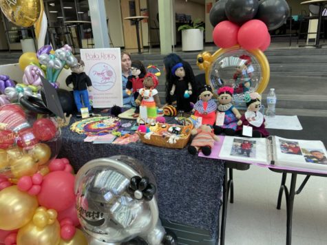 Students had the opportunity to buy handmade dolls at the Mercadito event.
