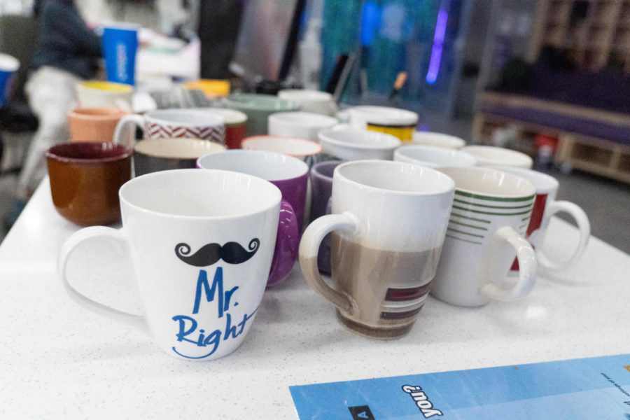 Coffee mugs awaiting those who placed in the climbing competition.