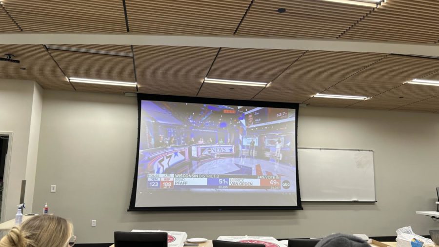 Students watch as the election results came in while they ate pizza and talked about the candidates. The Election Watch Party on Nov. 8 in Lindquist Hall Room 101 was filled with political discussion from all sides of the aisle.