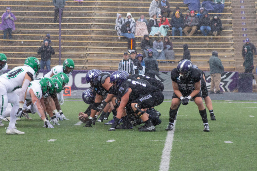 The Weber State University football team setting for a field goal block.