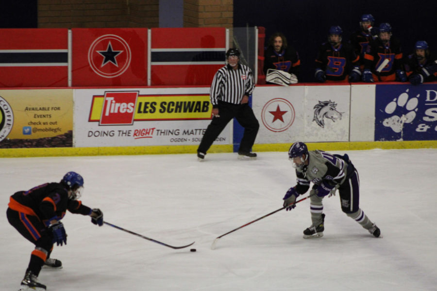 Forward position Rob Simmons, facing off against Boise State defensemen player, Camden Gallagher, during their game on Oct. 28, 2022.