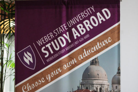 A banner advertising the Study Abroad program hangs outside the Study Abroad office in the Student Services building.