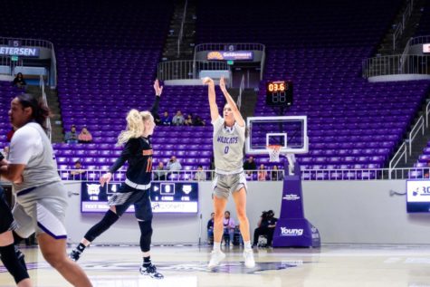 Wildcat Laura Taylor (0) attempts a free throw as an Idaho State player tries to block their shot on Jan 30.