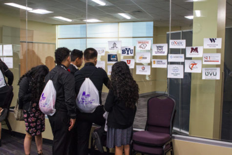 Students figuring out a puzzle activity at the Latinos in Action Youth Leadership Conference. Taken in 2018.