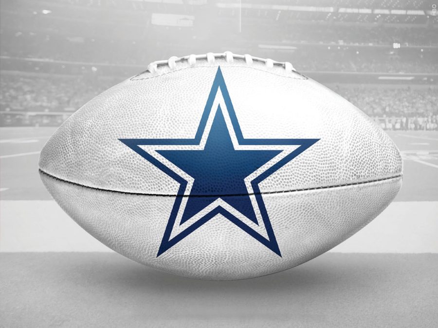 The Dallas Cowboys logo printed on a football.