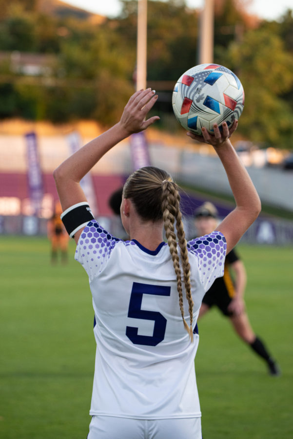 Womens soccer player Andelin Binford preparing to throw a soccer ball during a soccer game at WSU on Sept. 22, 2022.