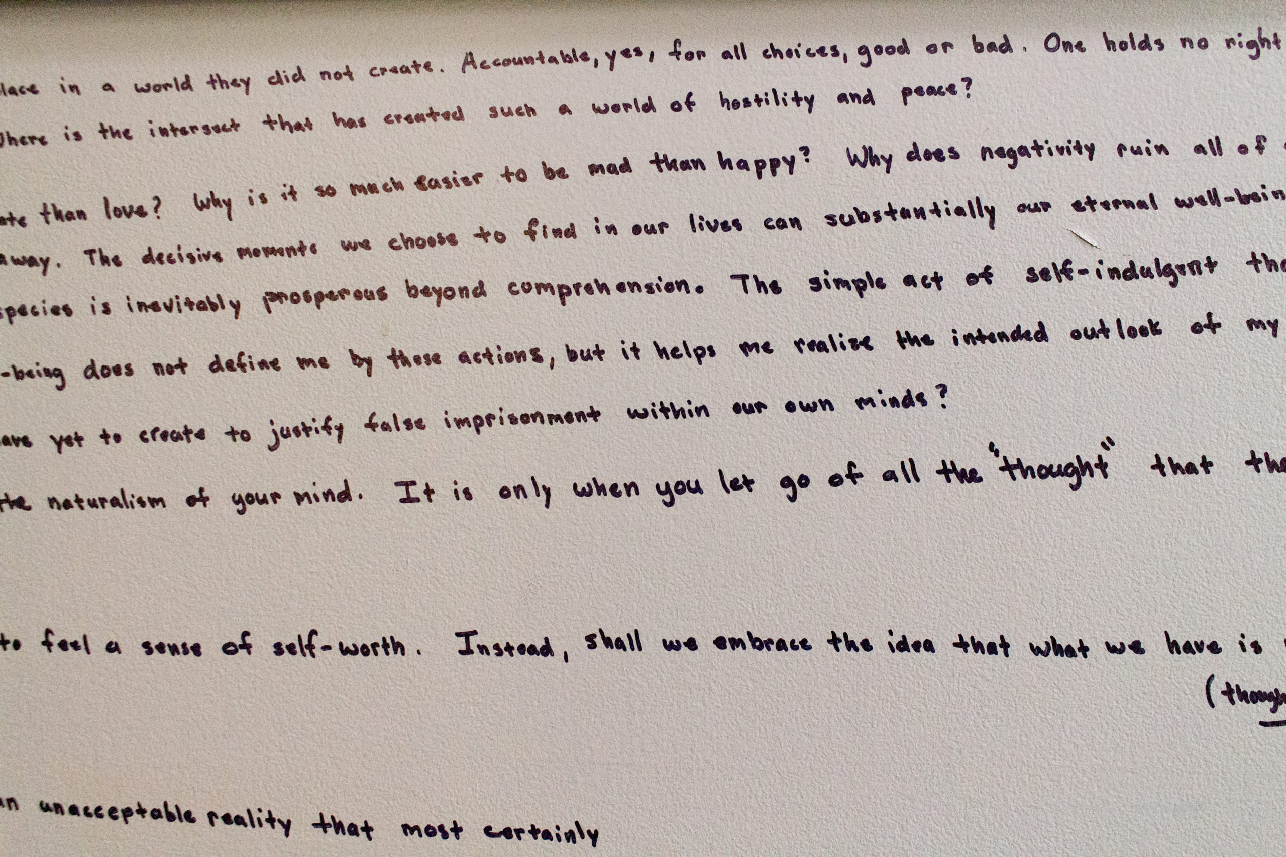 Benjamin Esss essay written on the wall on the third floor of the McKay Education building.