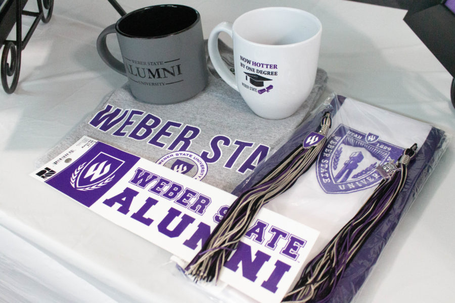 Alumni swag laid out for graduates to buy. Photo taken in 2022.