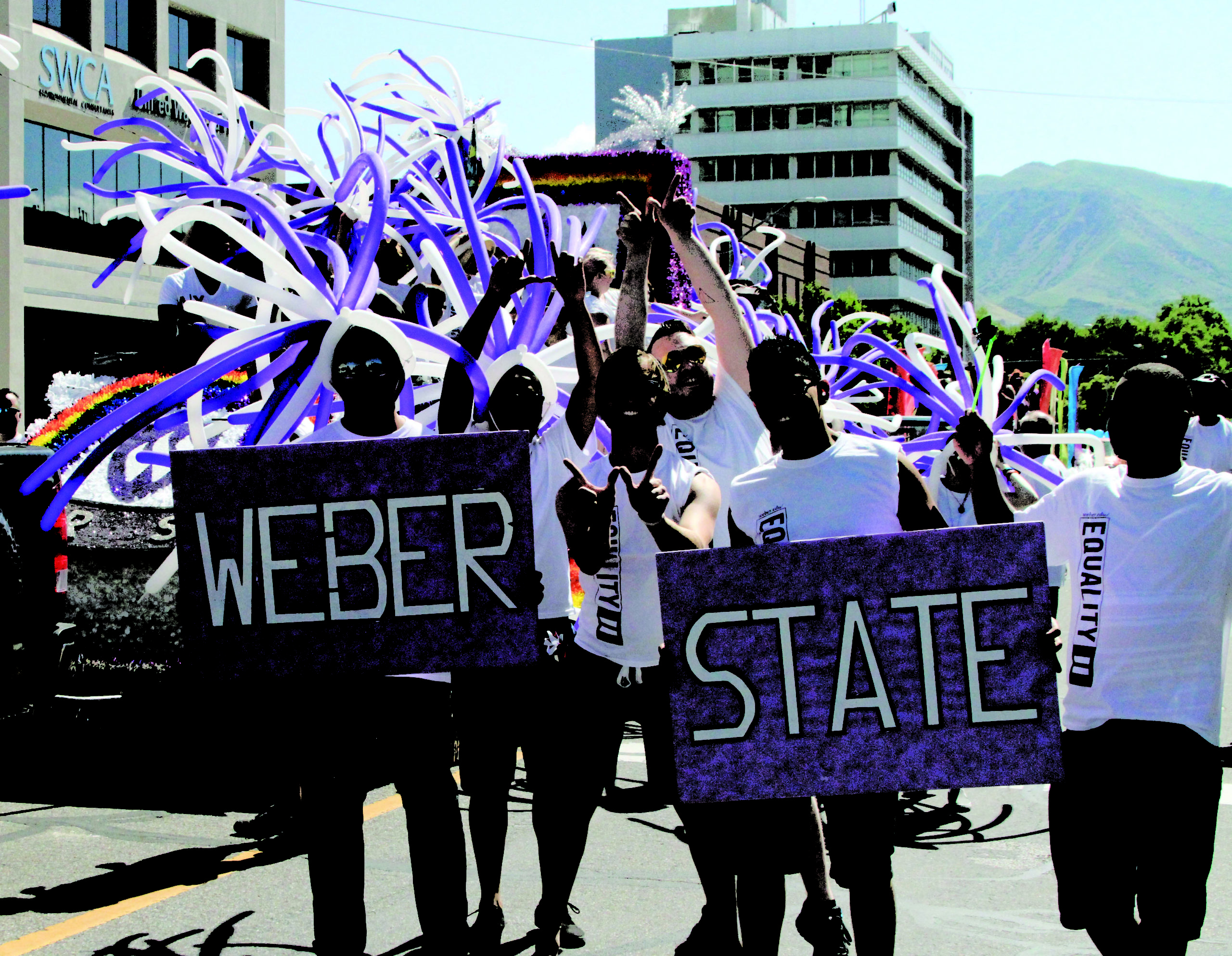 Students celebrating Pride by walking in the the 2014 Ogden Pride Parade.