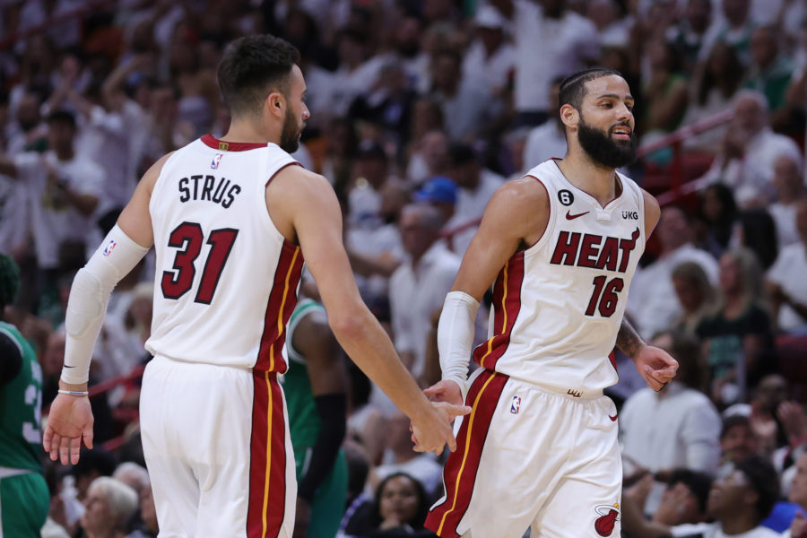 The Miami Heats Max Strus (31) and Caleb Martin (16) celebrate during second-quarter action against the Boston Celtics in Game 4 of the Eastern Conference Finals at Kaseya Center on May 23, 2023, in Miami.