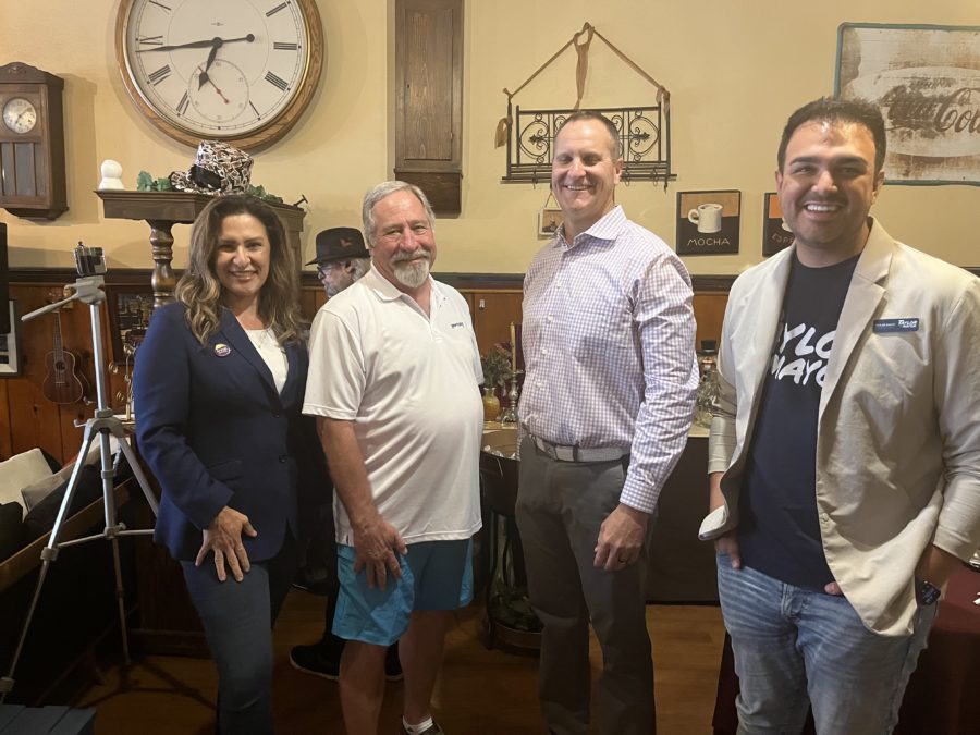 Mayoral Candidates (left to right) Angel Castillo, Jon Greiner, Ben Nadolski and Taylor Knuth at the Two Bit Street Cafe meeting and greeting Ogden citizens and community members.