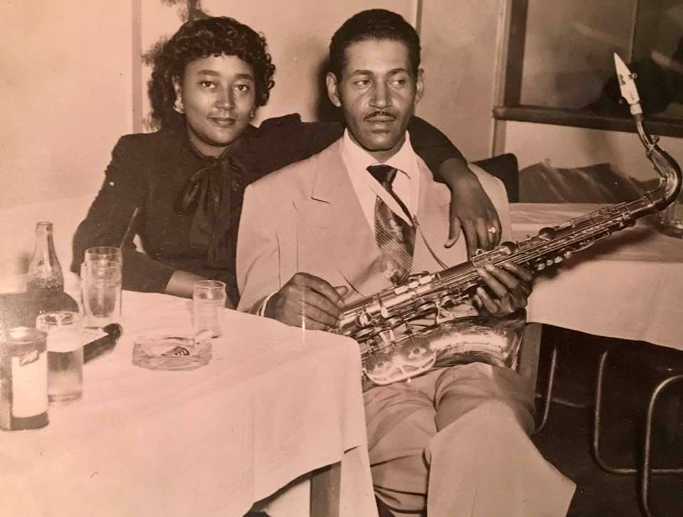 Joe and Thelma McQueen sitting together.