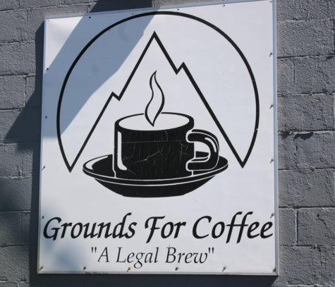 A Grounds for Coffee sign seen outside of the Harrison Blvd. shop.