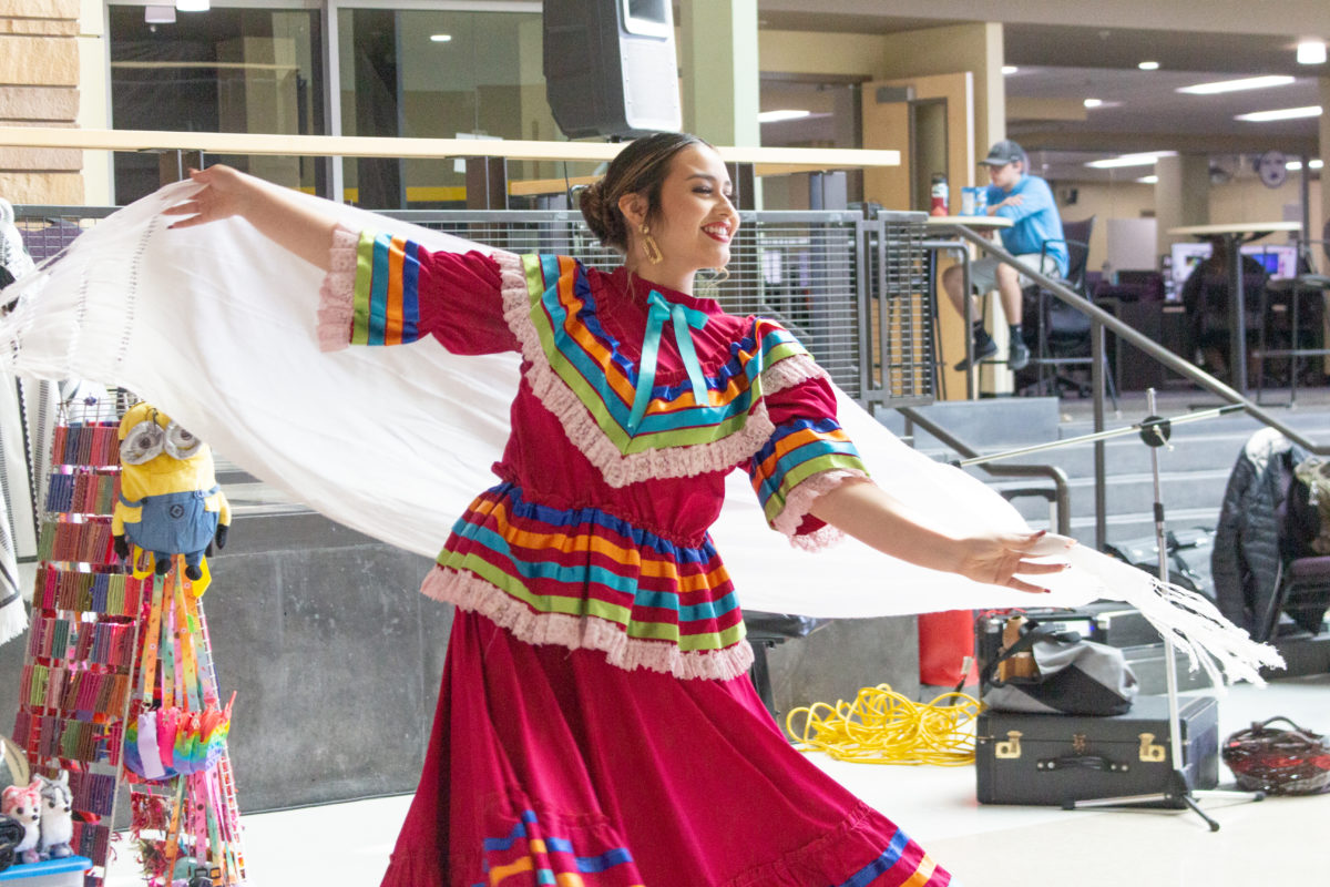 Weber State University Hispanic Senator Jennifer Duenaz dancing Ballet Folklorico during Hispanic Heritage Month in 2022.