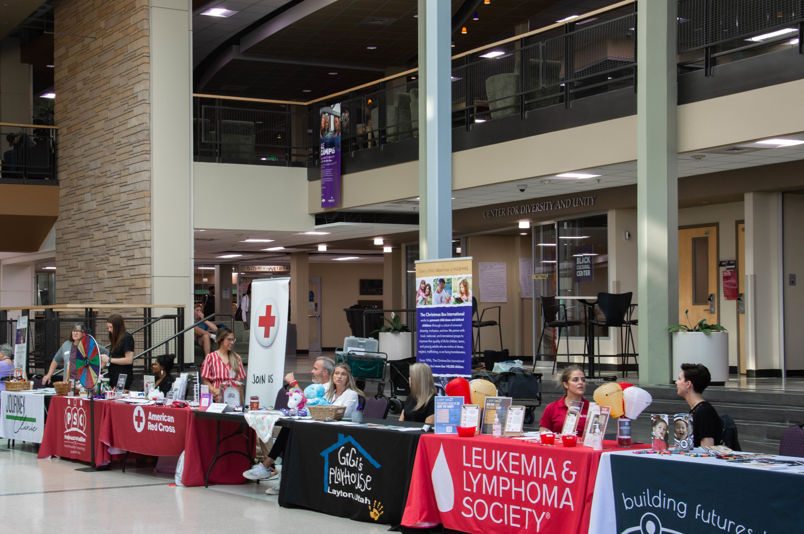 Some of the volunteer organizations present during the Volunteer Fair with informative brochures and giveaway items.