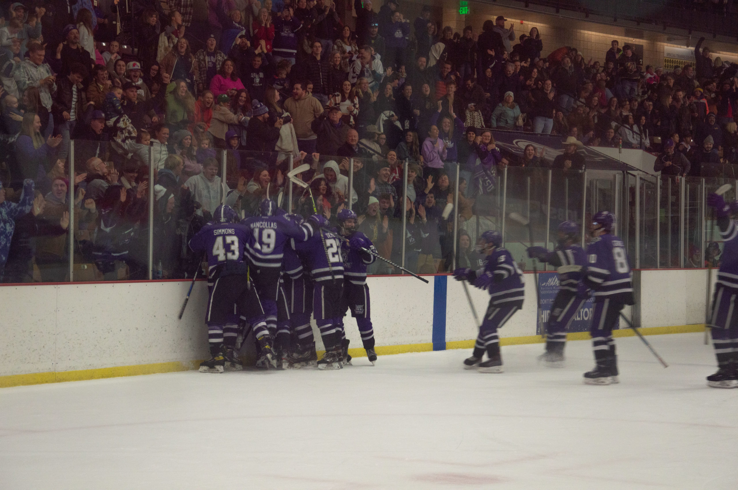 Wildcats celebrate after forward Cole VanOrmans goal in overtime to win the game. Weber State Universitys hockey team beat Utah State University 2–1 on Feb. 17, 2023 at the Ice Sheet.