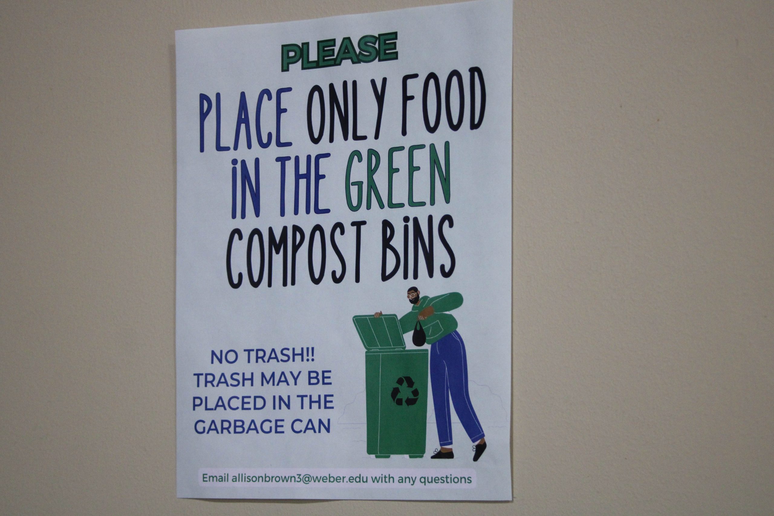 A sign hung up above the compost bin in Shepard Union advising that food is only to be disposed of in this bin to limit waste.