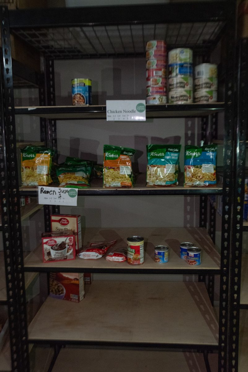 The food that has been donated to the Weber State University food pantry, lined up on shelves.