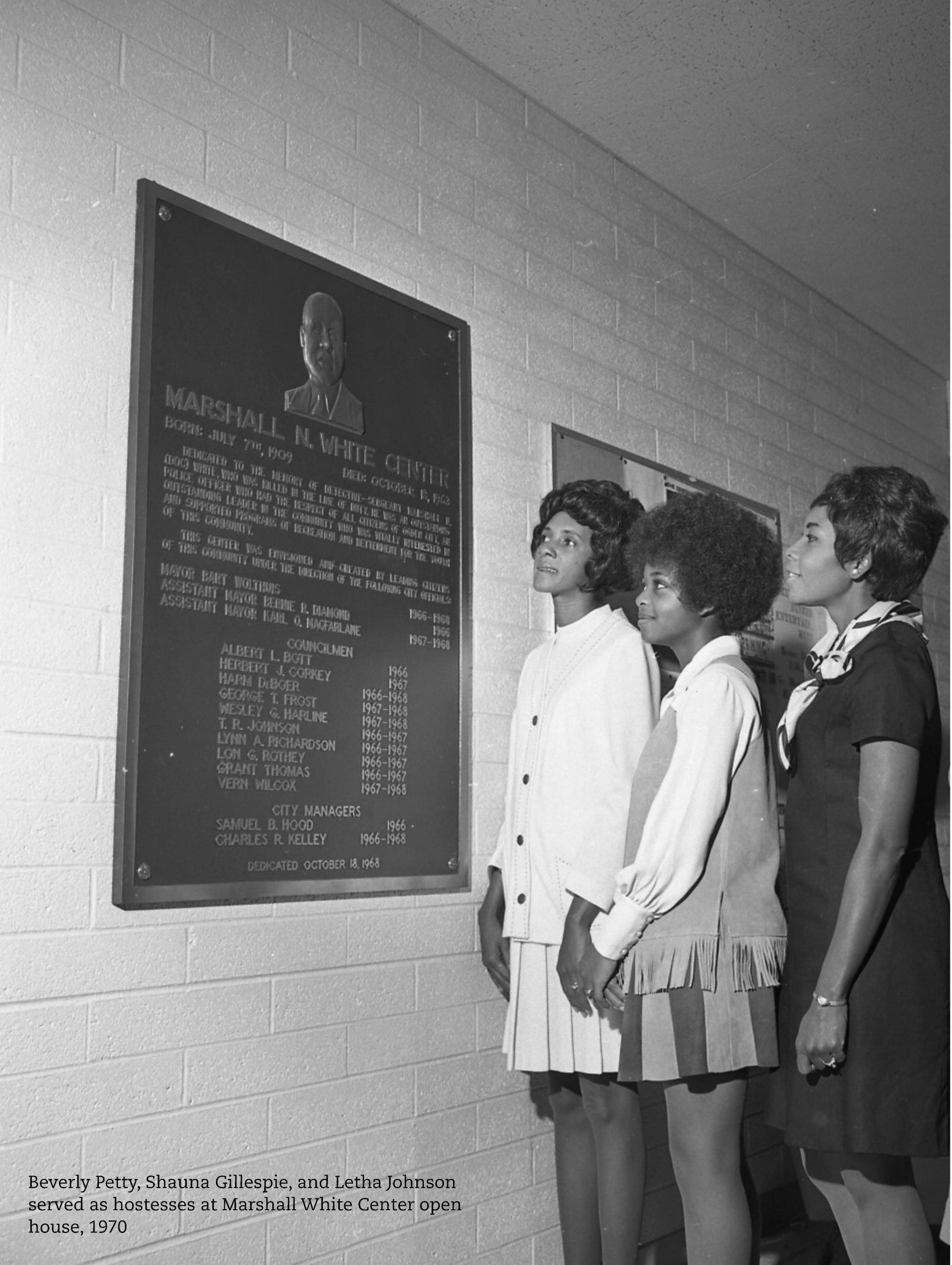 Beverly Petty, Shauna Gillespie and Letha Johnson served as hostesses at Marshall White Center open house, 1970.