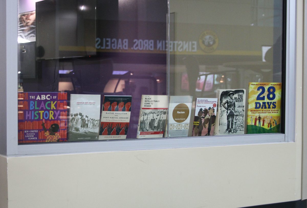 Educational books about black history, racism and mental health, are lined up in the window of the Black Cultural Center.