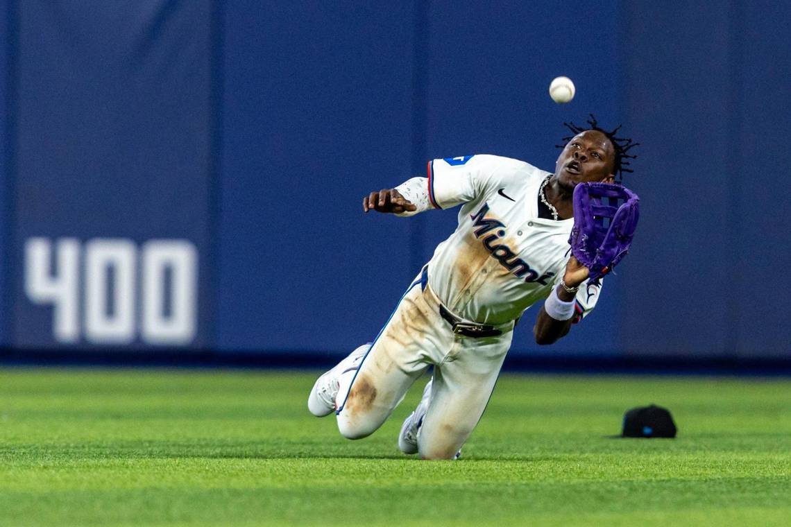 Miami Marlins center fielder Jazz Chisholm Jr. (2) makes a catch in the outfield for an out during the seventh inning of an MLB game on opening day against the Pittsburgh Pirates at Loan Depot Park in Miami, Florida, on Thursday, March 28, 2024.