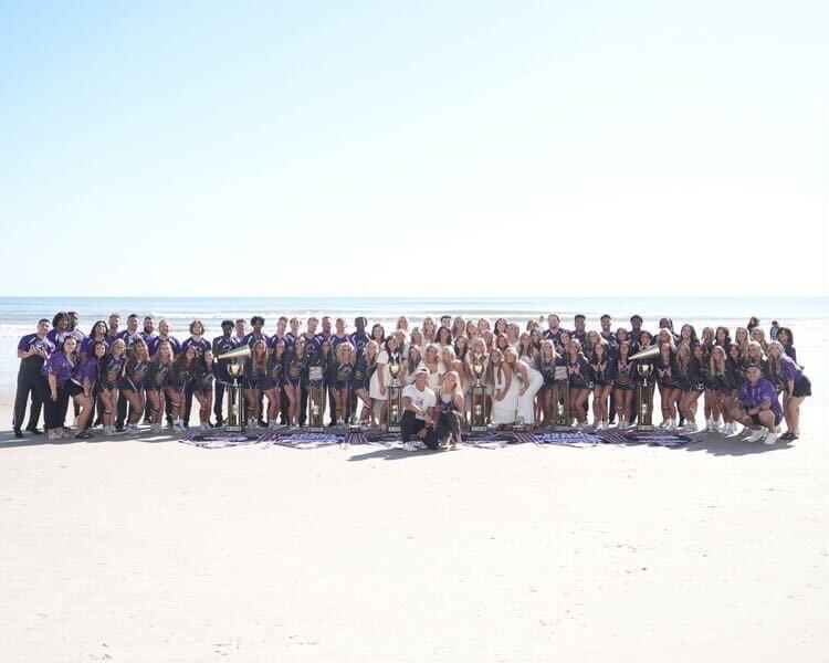 Weber State Cheer and Dance Team celebrating their clean sweep on Daytona Beach.