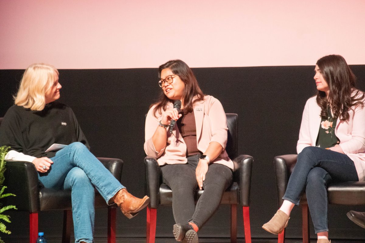 Utah Film Commissioner Virginia Pearce (left) listens to Andrea Baltazar (middle) answer a question at the 100 year anniversary of Ogdens Peerys Egyptian Theater.