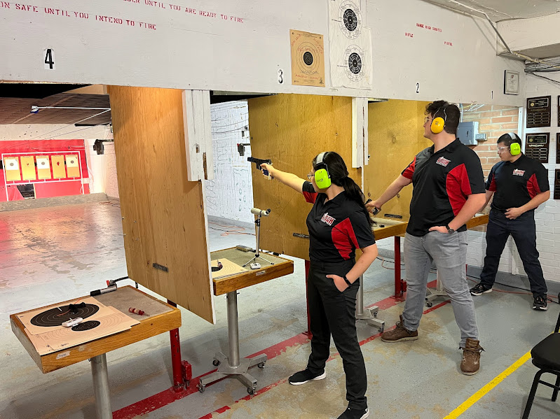 %28from+left%29+University+of+Utah+Pistol+Team+members+Bridget+Raymundo%2C+Amir+and+Soren+Portillo+shooting+in+a+qualifier+for+nationals+at+the+U+pistol+range+on+Feb.+9%2C+2024.+Their+scores+decided+if+they+were+invited+to+collegiate+nationals+for+precision+pistol+shooting%2C+which+was+held+in+Georgia+from+March+20+to+23.