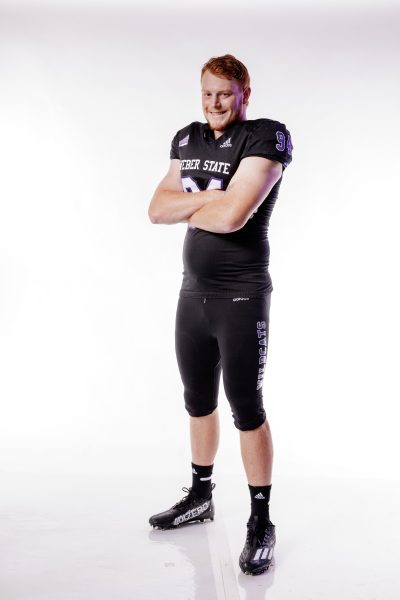 Weber State University Defensive End, Brayden Wilson, posing for a photo.