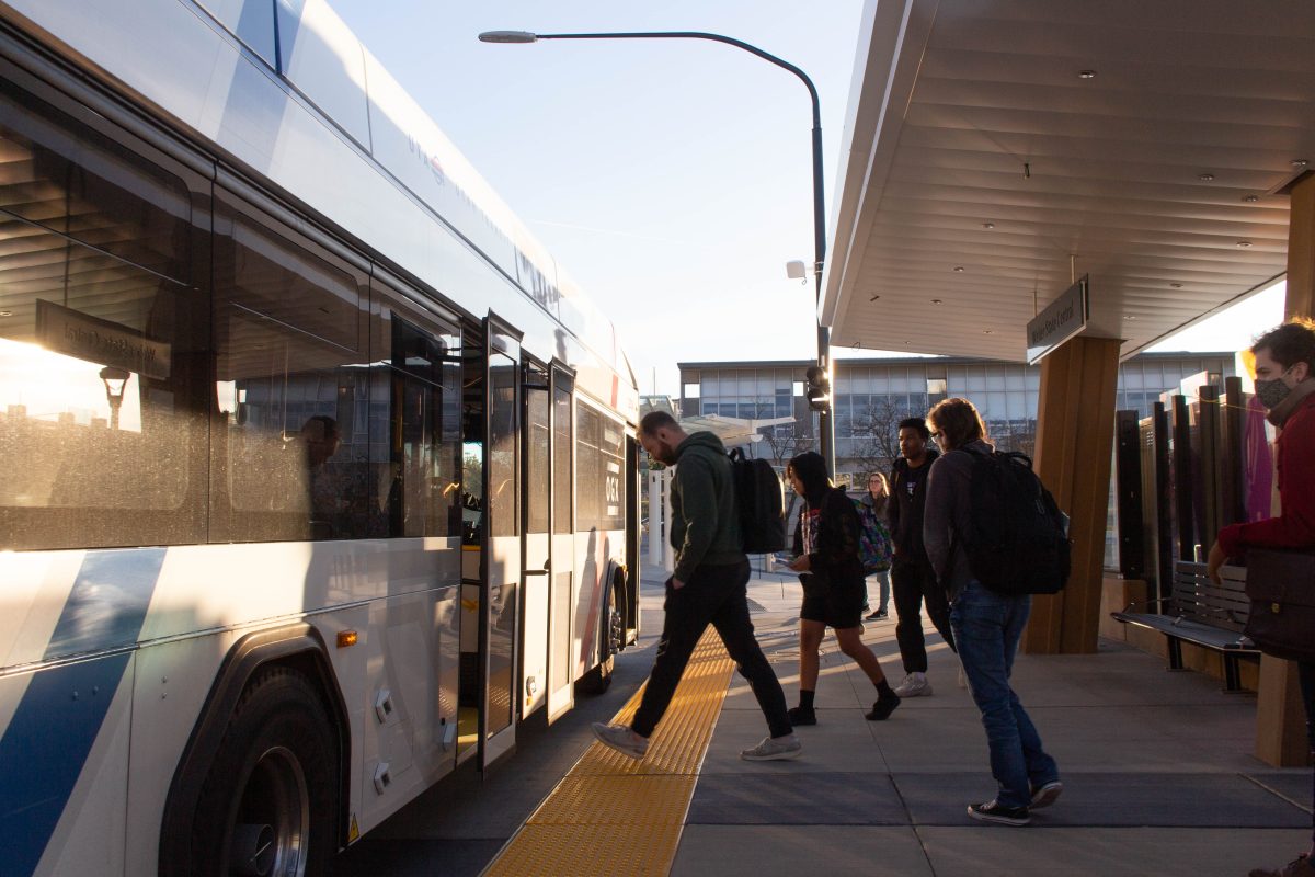 A group of students preparing to board the OGX bus at Weber State University. 