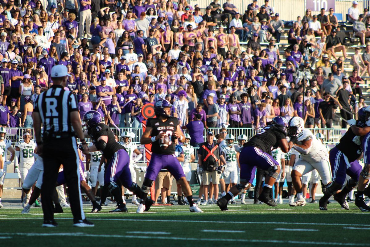 Weber State University Quarterback, Richie Munoz (#10), preparing to pass the ball down the field.