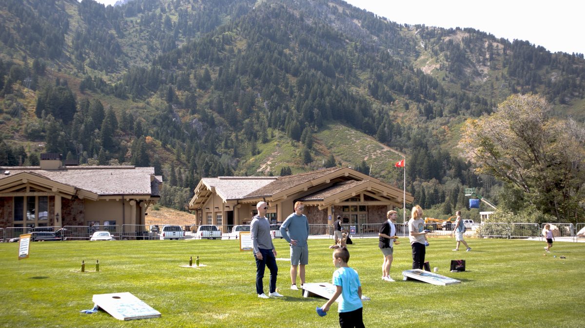 Many festival-goers enjoy lawn games like cornhole.