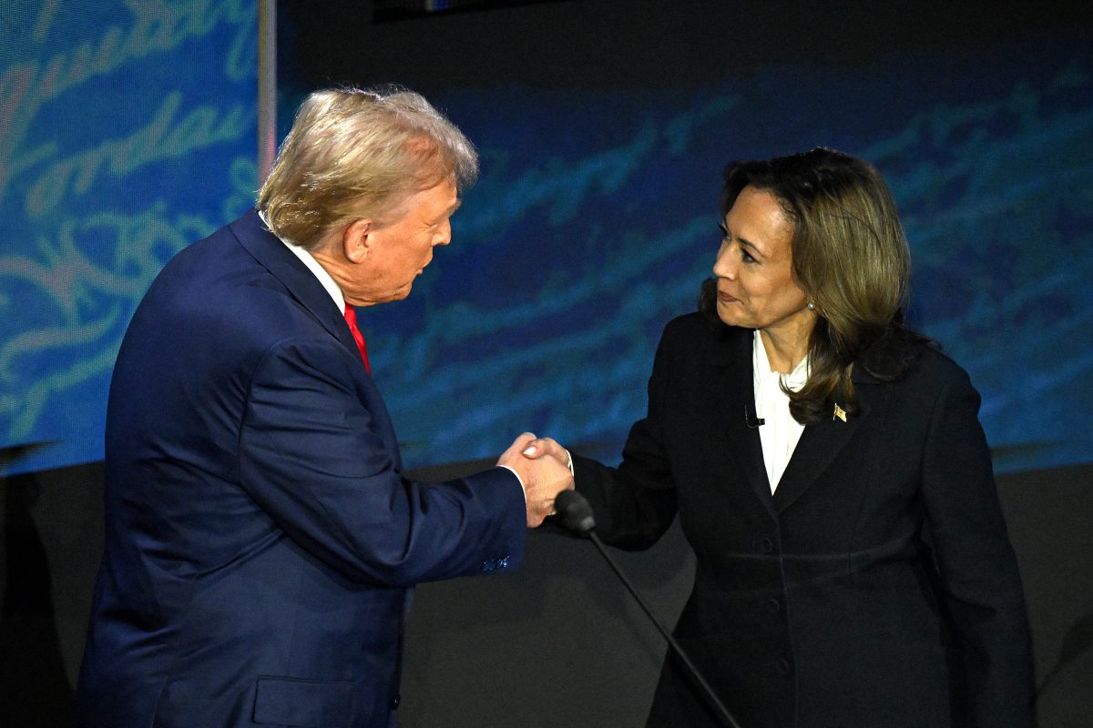 US Vice President and Democratic presidential candidate Kamala Harris (R) shakes hands with former US President and Republican presidential candidate Donald Trump during a presidential debate at the National Constitution Center in Philadelphia, Pennsylvania, on September 10, 2024. 