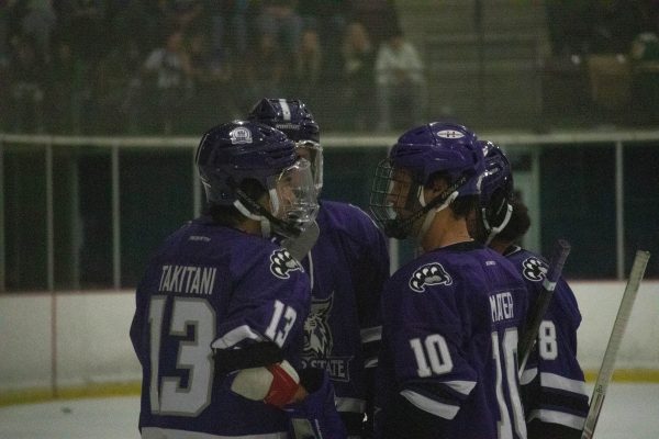 The Weber State team discusses a plan before continuing play.