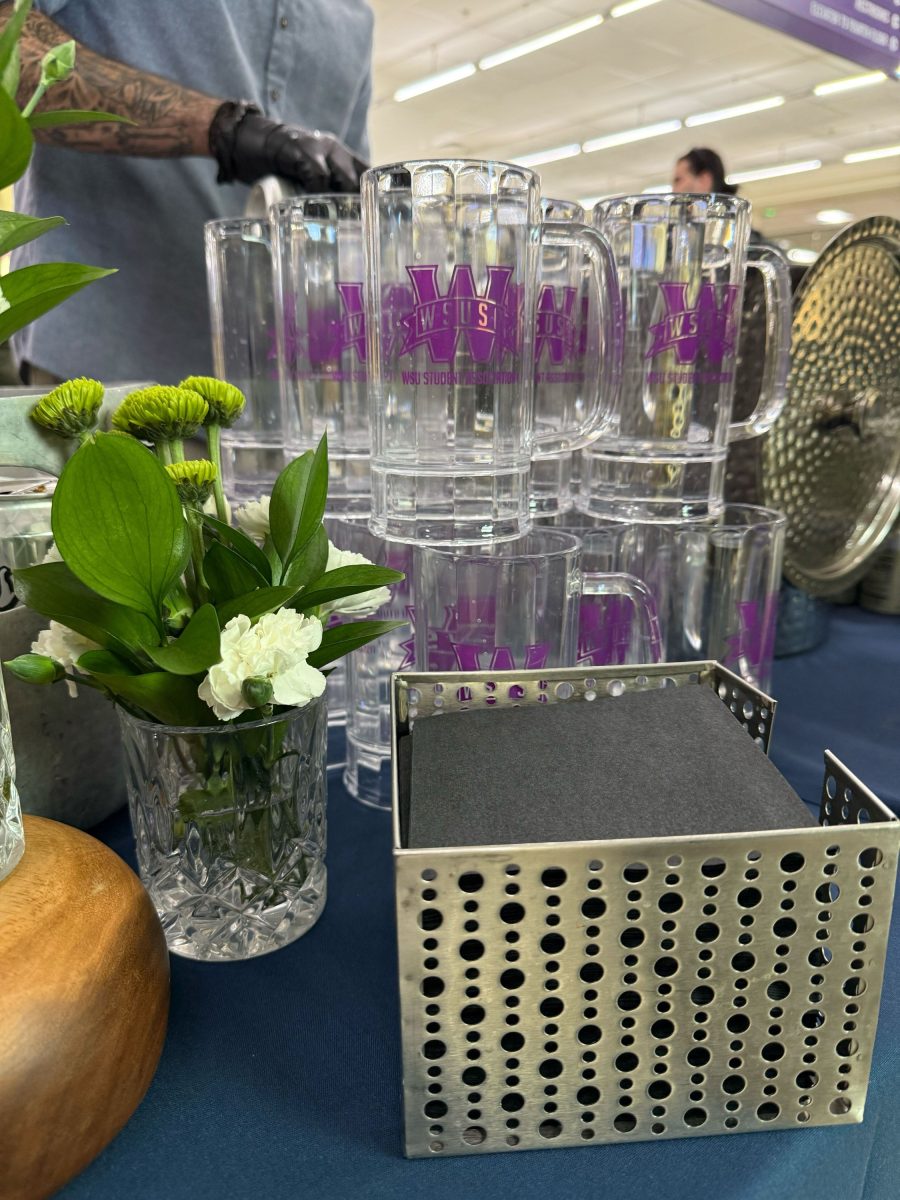 Weber State University logos on beer steins for the first 100 students at the Weber State Oktoberfest.