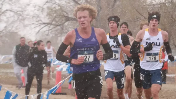 Weber State Men's Cross Country runner, Peter Visser, running during Regionals.