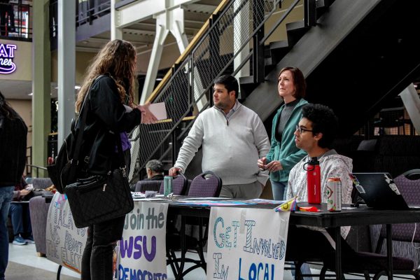 WSU Democrats invite Kate Nielsen (second right), Chair of the Democratic Party for Weber County in correspondence to the rally.